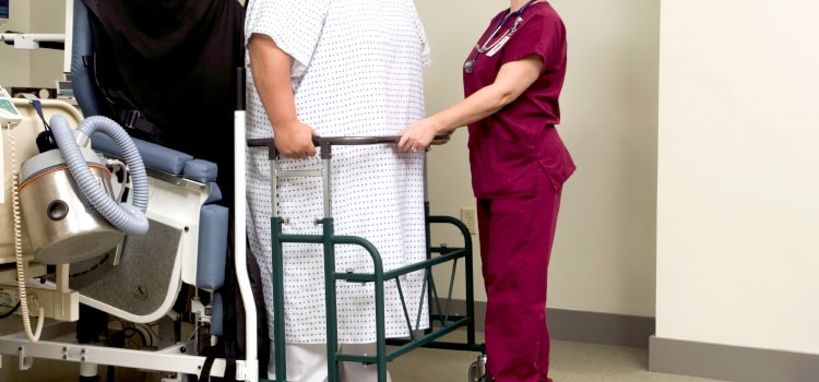 single nurse helping to mobilize 800 pound patient.